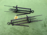 Two different Anglo Impassable Mole Traps