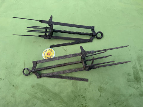 Two different Anglo Impassable Mole Traps